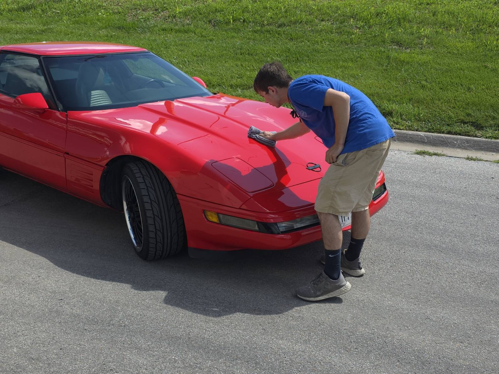 Ben polishing a car in Omaha NE